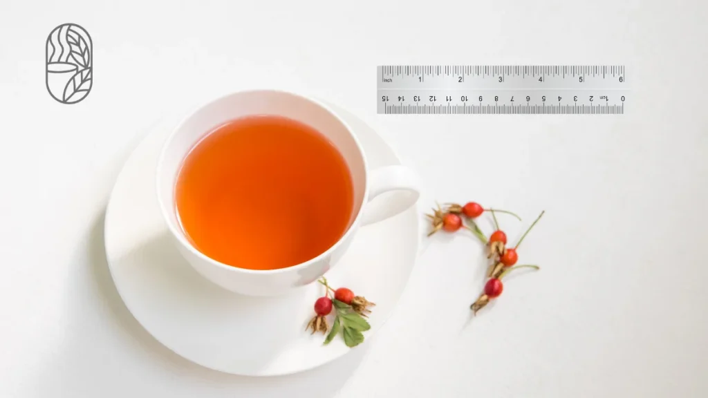a digital tea scale beside measured portions of CTC, green, orthodox, white and fruit tea, with a 200ml cup and measuring spoon.